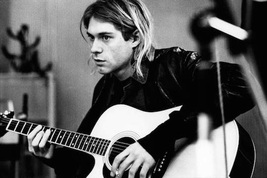 Photo of Kurt COBAIN and NIRVANA, Kurt Cobain recording in Hilversum Studios, playing Takamine acoustic guitar  (Photo by Michel Linssen/Redferns)